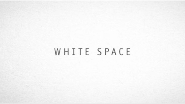 Picture of white background with black words "White Space" in the center