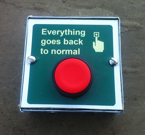 Picture of red button, next to white text that reads "Everything goes back to normal"