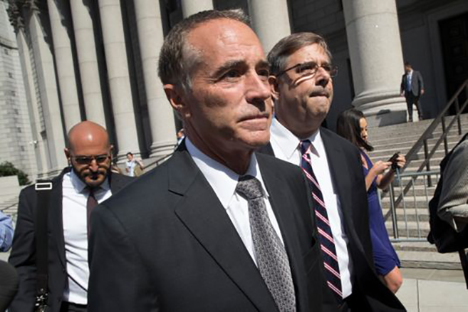 Picture of Congressman Chris Collins leaving federal courthouse after his indictment for insider trading